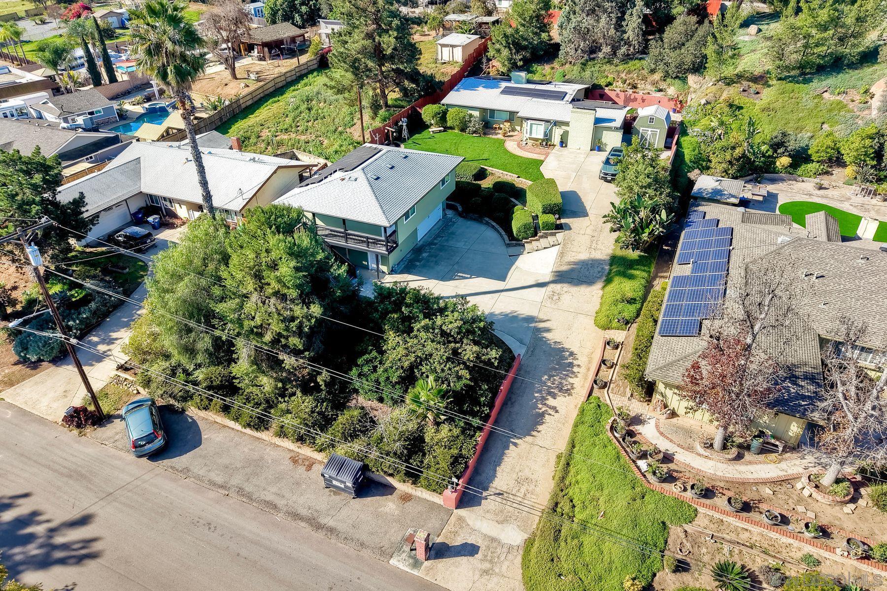 1912 Jalisco Road El Cajon, CA 92019 - Photo 20 of 38 an aerial view of a house with a yard and garden