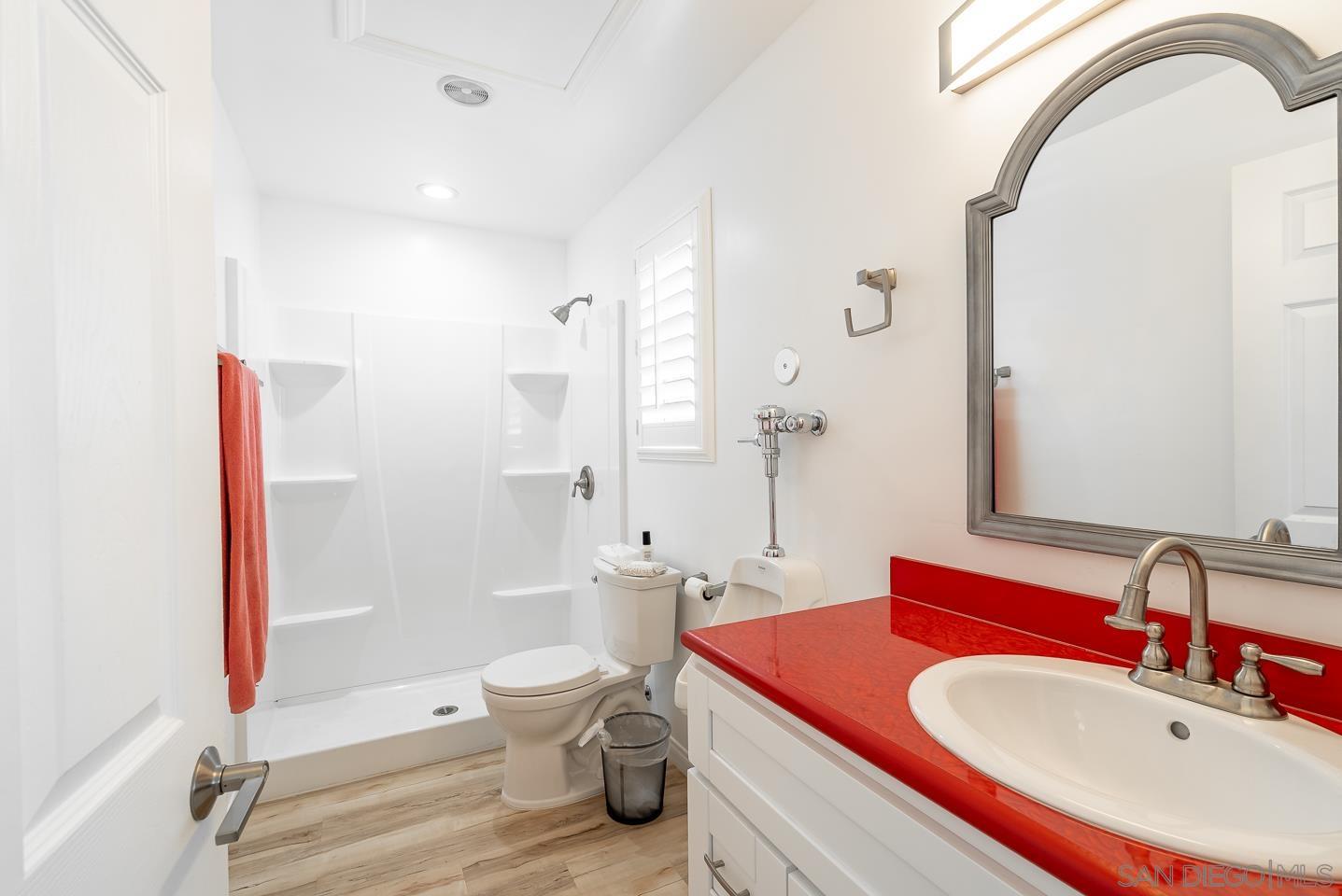 1912 Jalisco Road El Cajon, CA 92019 - Photo 29 of 38 a bathroom with a sink and a mirror