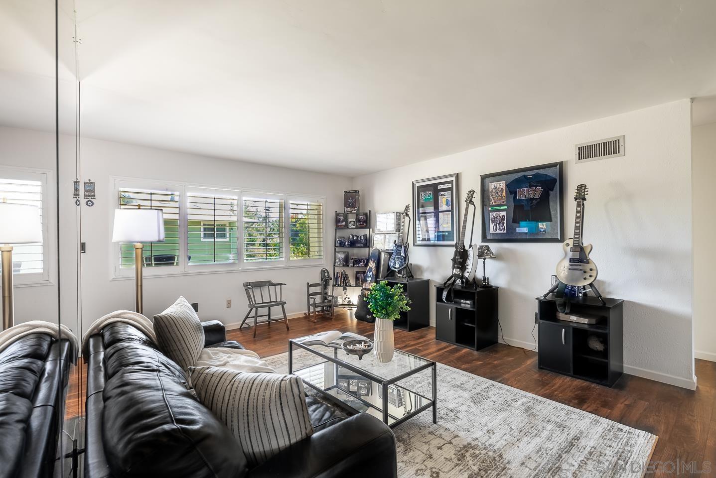 1912 Jalisco Road El Cajon, CA 92019 - Photo 4 of 38 a living room with furniture and a large window