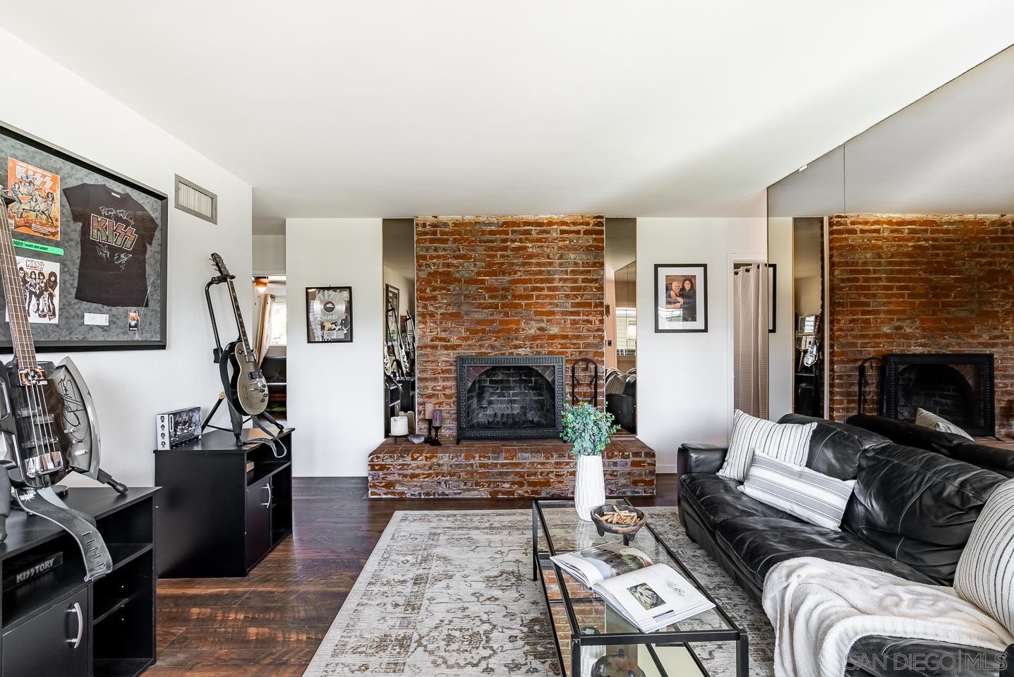 1912 Jalisco Road El Cajon, CA 92019 - Photo 10 of 38 a living room with furniture and a fireplace