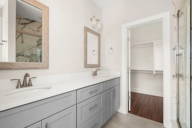 a bathroom with a sink and a mirror