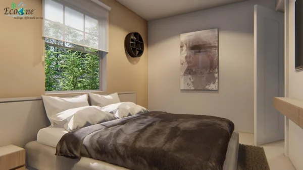 a bedroom with a bed and a window