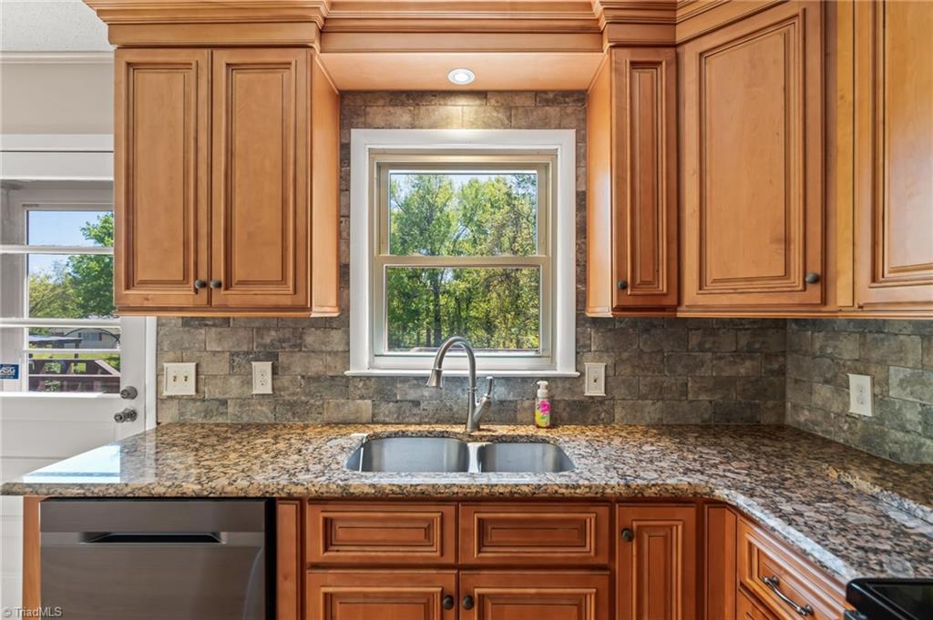 3975 Pine Ridge Drive Trinity, NC 27370 - Photo 11 of 48 Stainless steel sink and accent lighting