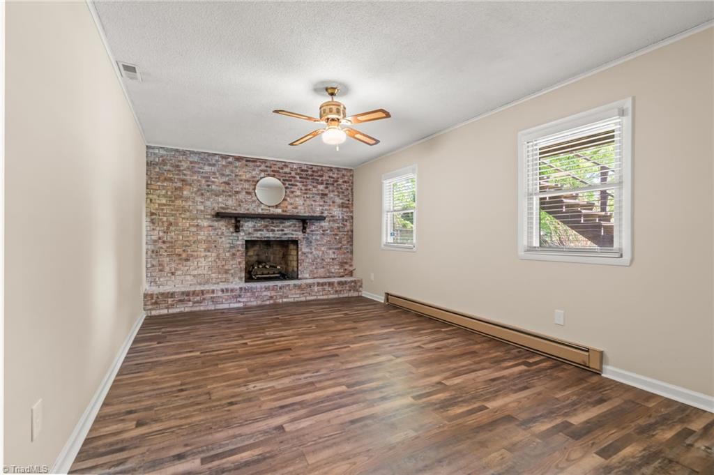 3975 Pine Ridge Drive Trinity, NC 27370 - Photo 28 of 48 Den with fireplace on lower level