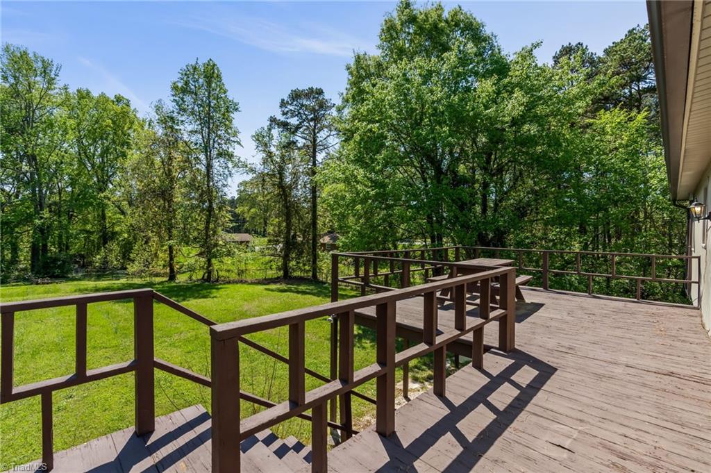 3975 Pine Ridge Drive Trinity, NC 27370 - Photo 36 of 48 Rear deck off kitchen and dining area