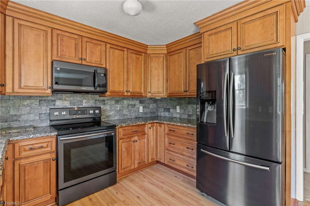 3975 Pine Ridge Drive Trinity, NC 27370 - Photo 9 of 48 Upgraded kitchen cabinets and appliances