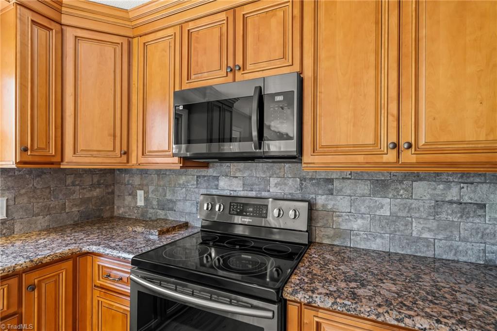 3975 Pine Ridge Drive Trinity, NC 27370 - Photo 10 of 48 Solid surface countertops and back splash