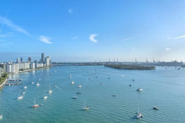 a vase of flowers sitting on a table