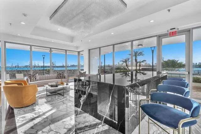 a room with furniture and a mirror