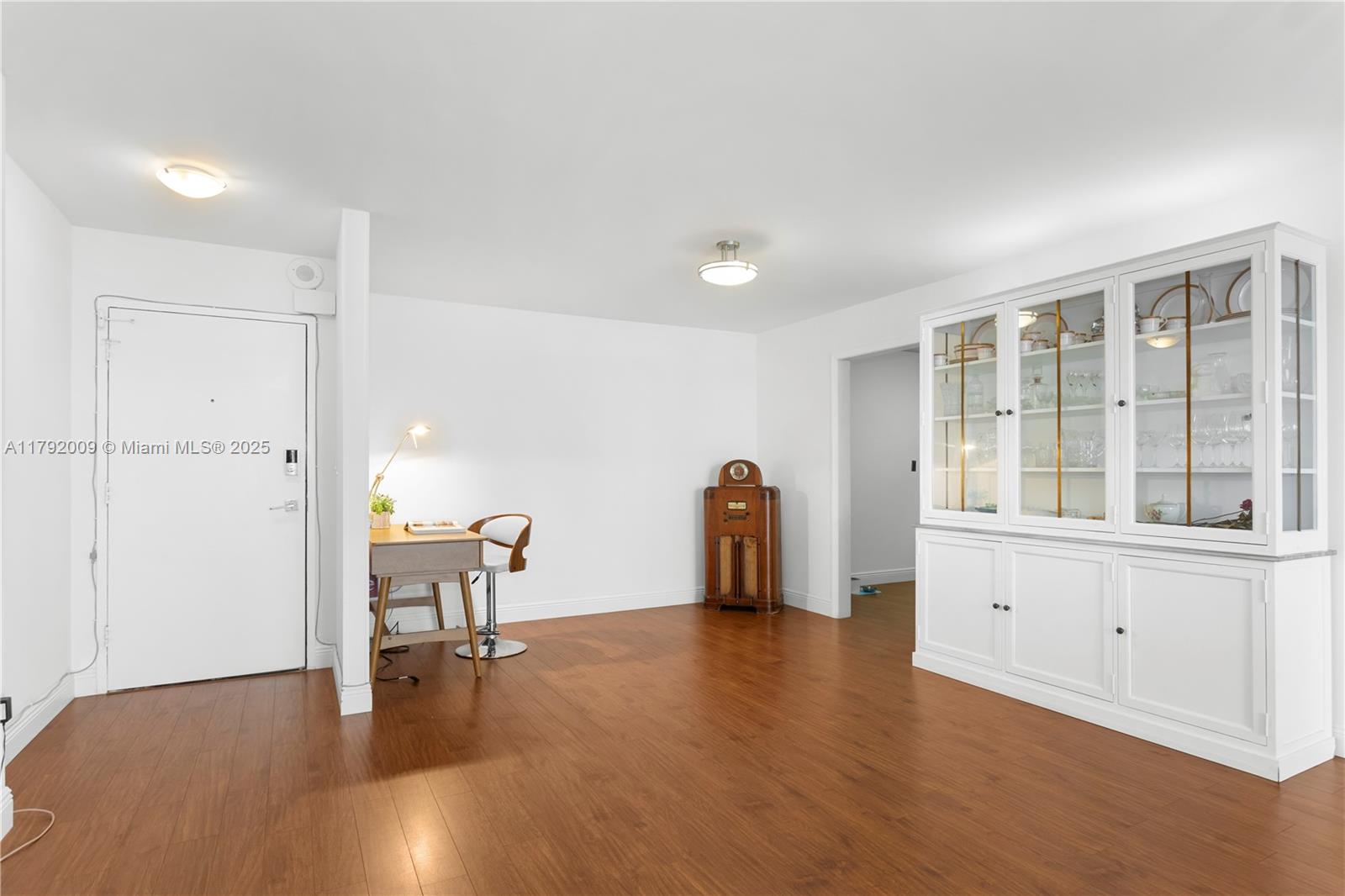 11 Island Avenue, Unit 407 Miami Beach, FL 33139 - Photo 8 of 44 a living room with furniture and a table