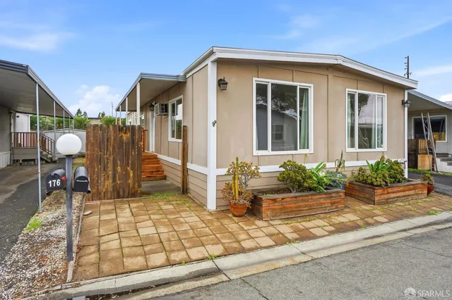 a front view of a house with patio