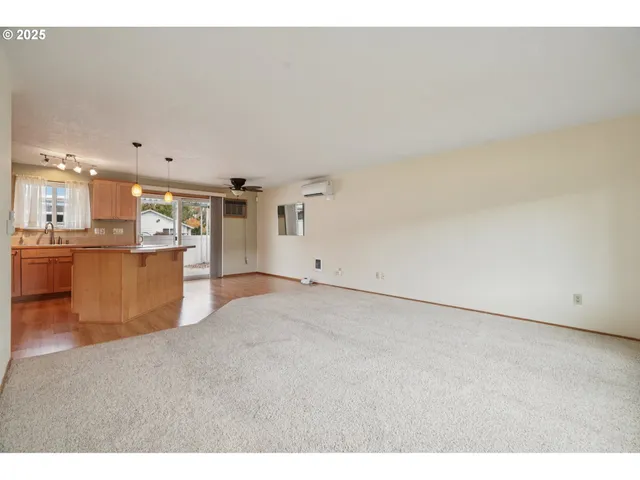 a view of a kitchen with a sink