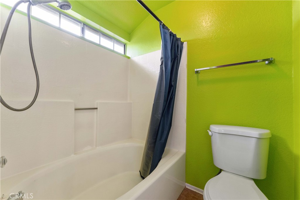 3635 Daybreak Street El Monte, CA 91732 - Photo 16 of 24 a bathroom with a toilet and a shower
