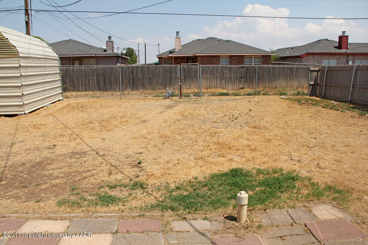 4905 Parker Street Amarillo, TX 79110 - Photo 22 of 25 a view of a backyard of the house