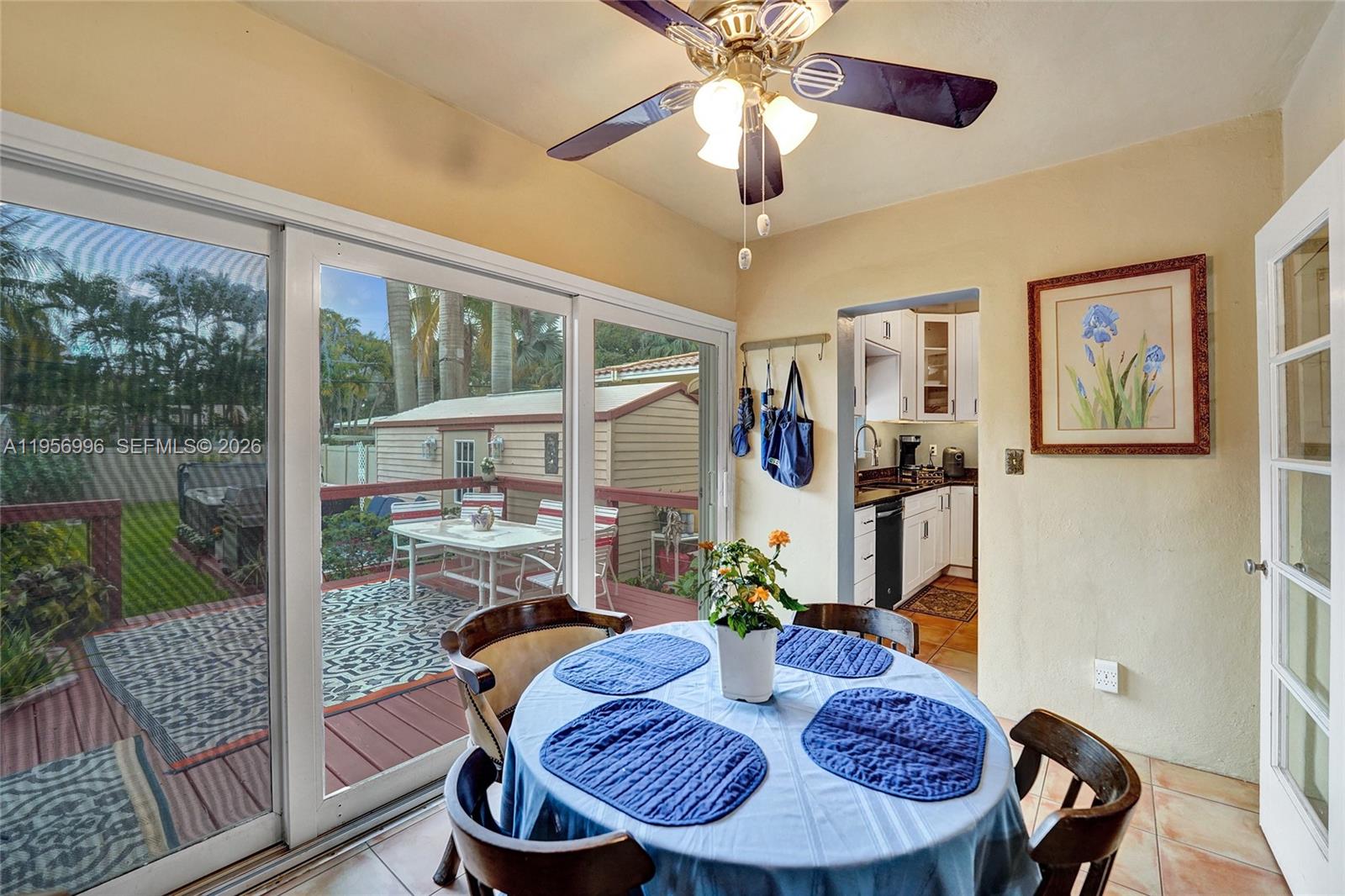 1340 Jackson Street Hollywood, FL 33019 - Photo 21 of 49 a view of a dining room with furniture window and wooden floor