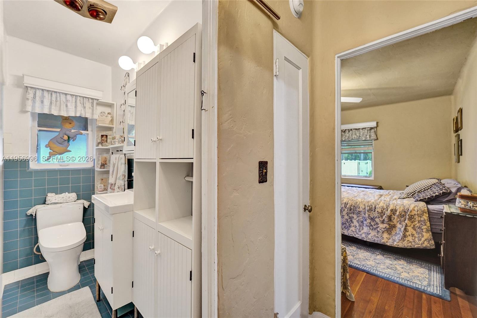 1340 Jackson Street Hollywood, FL 33019 - Photo 30 of 49 a bathroom with a toilet sink and shower