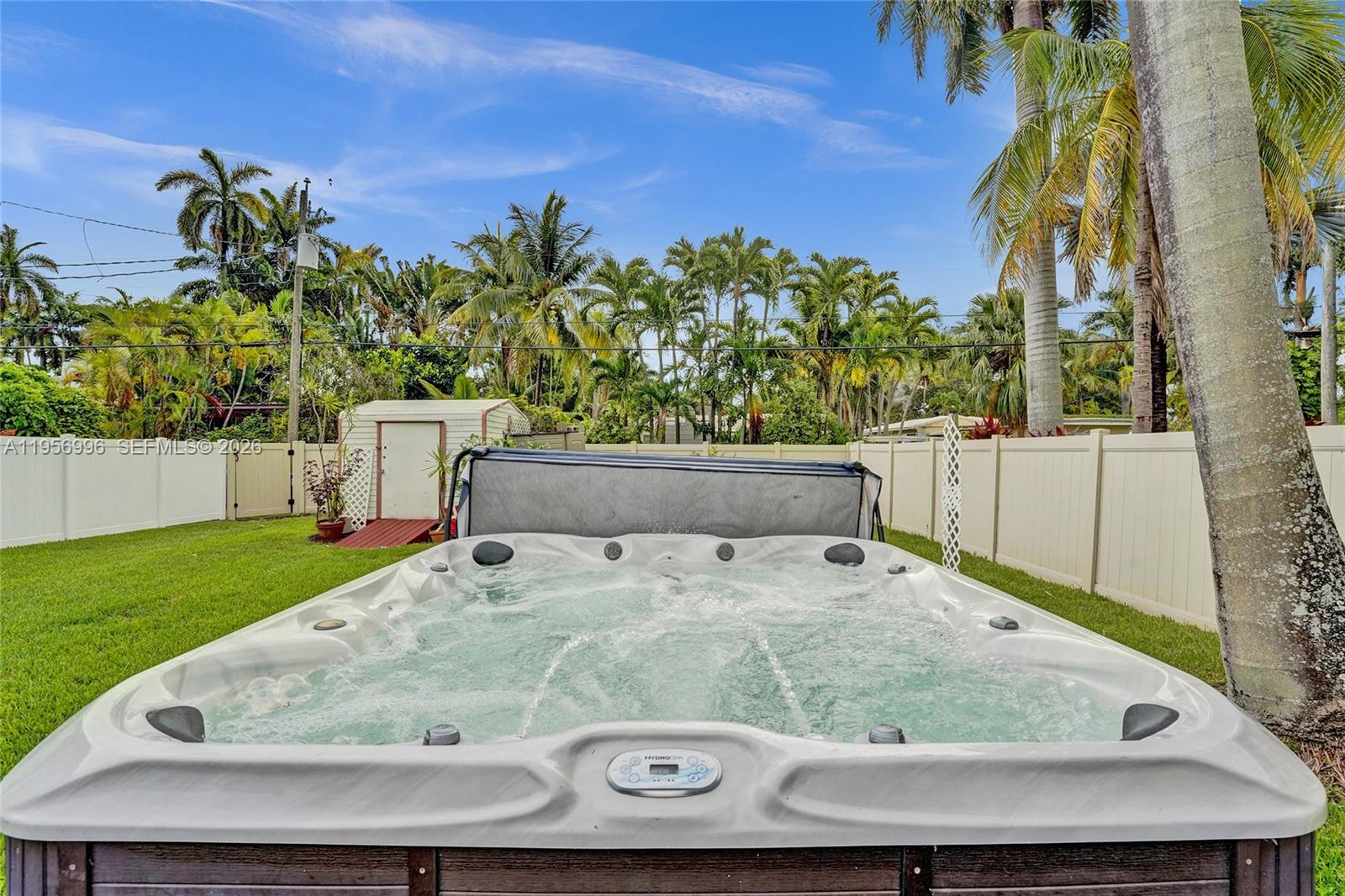 1340 Jackson Street Hollywood, FL 33019 - Photo 34 of 49 a view of swimming pool with a yard