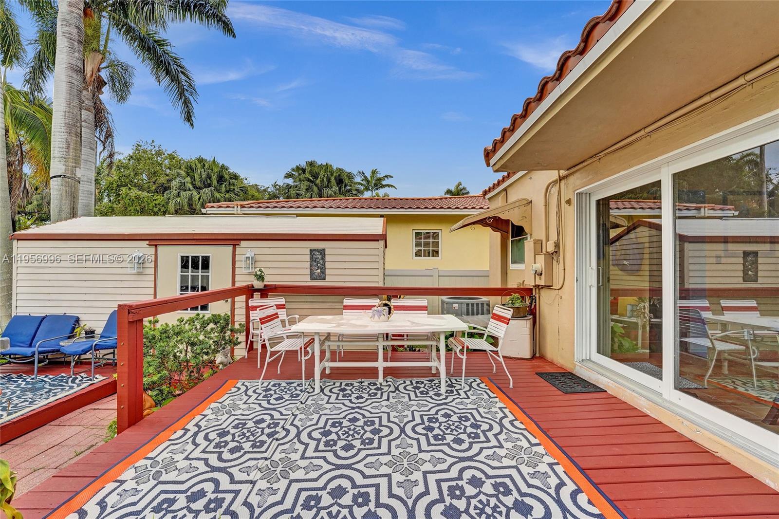 1340 Jackson Street Hollywood, FL 33019 - Photo 40 of 49 a couple of table and chair in the balcony