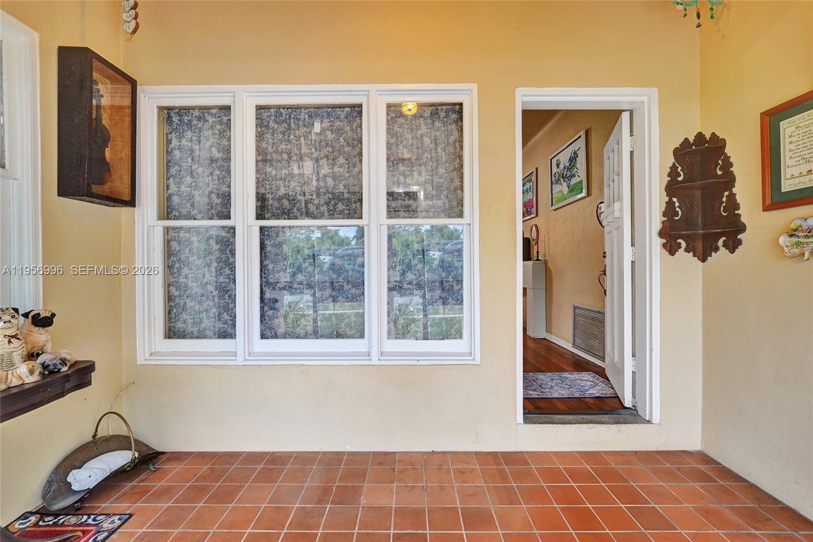 1340 Jackson Street Hollywood, FL 33019 - Photo 4 of 49 a view of an empty room and window