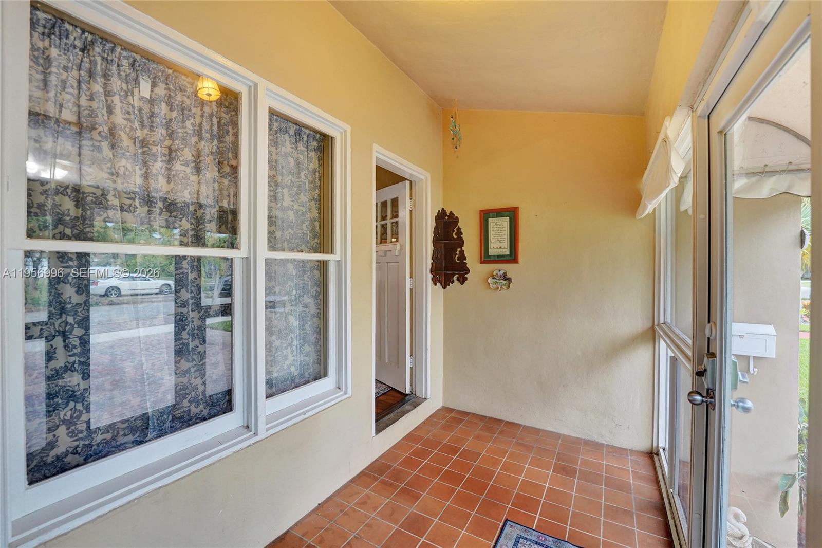 1340 Jackson Street Hollywood, FL 33019 - Photo 5 of 49 a view of a bathroom with a glass door