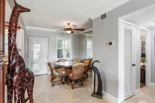a view of a livingroom with furniture and windows