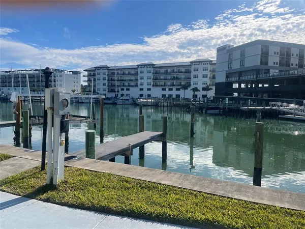 a view of a lake with a house next to a lake