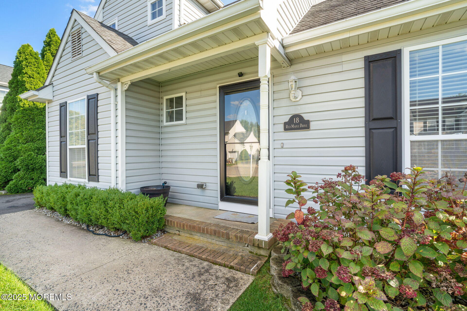 18 Red Maple Drive Brick, NJ 08724 - Photo 3 of 28 a front view of a house with garden