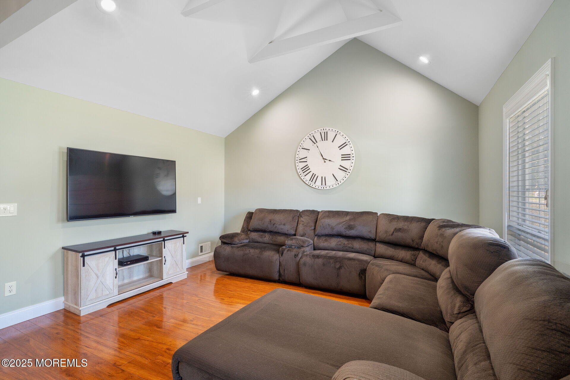 18 Red Maple Drive Brick, NJ 08724 - Photo 7 of 28 a living room with furniture and a flat screen tv