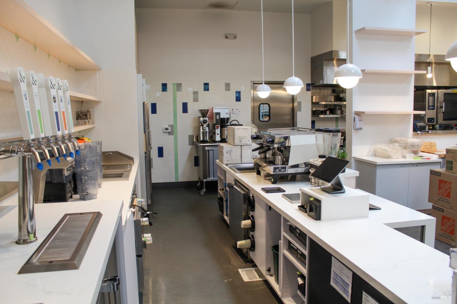 1111 Main Street, Unit B St. Helena, CA 94574 - Photo 2 of 10 a kitchen with a sink stove and refrigerator