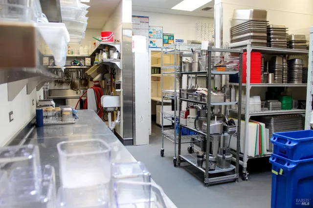 a storage room with washer and dryer