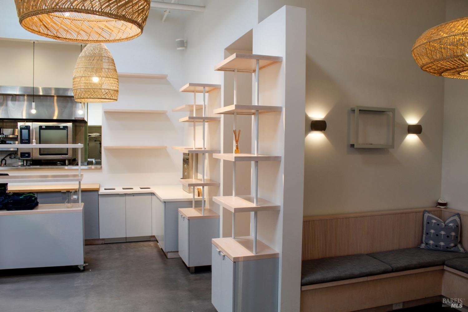 1111 Main Street, Unit B St. Helena, CA 94574 - Photo 8 of 10 a kitchen with cabinets and window