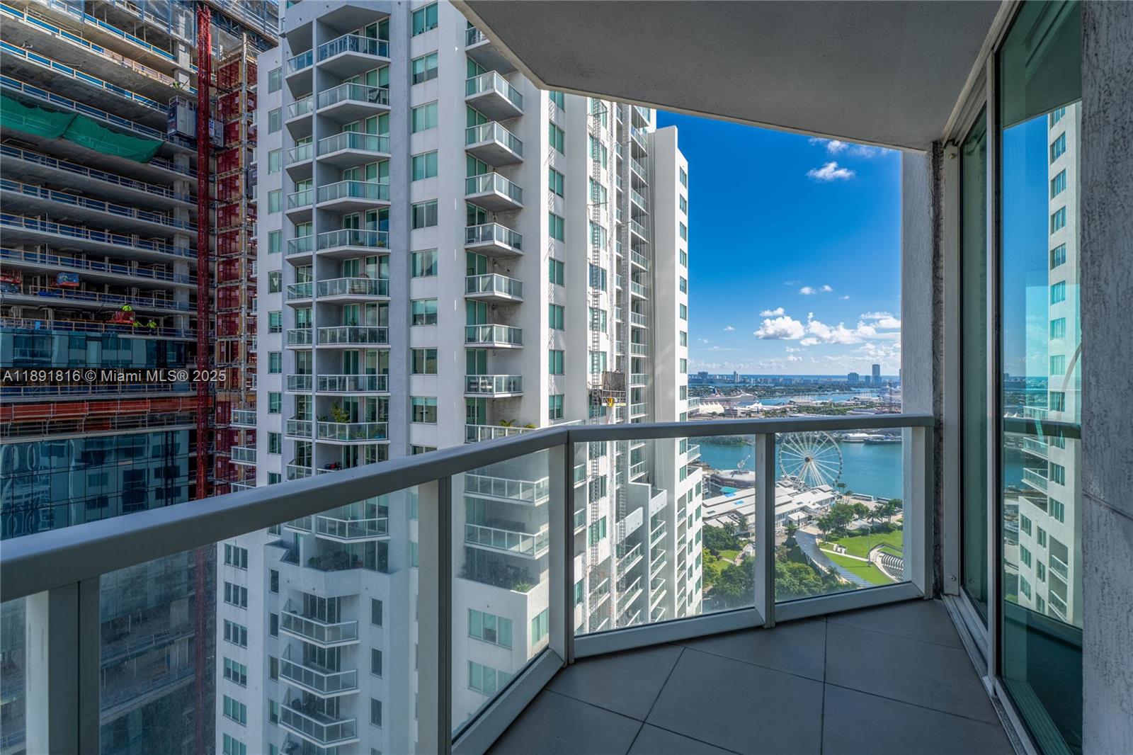253 Northeast 2nd Street, Unit 3203 Miami, FL 33132 - Photo 27 of 29 a view of a balcony with lake view