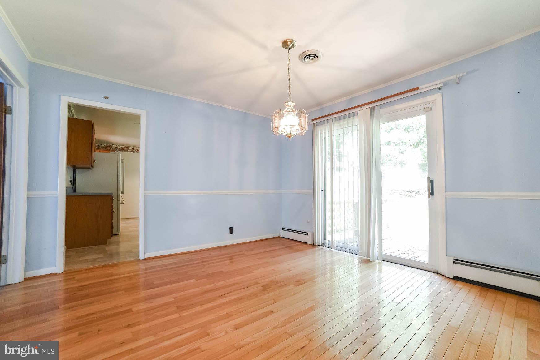 41211 Medleys Neck Road Leonardtown, MD 20650 - Photo 12 of 41 Dining Room exit to rear deck area