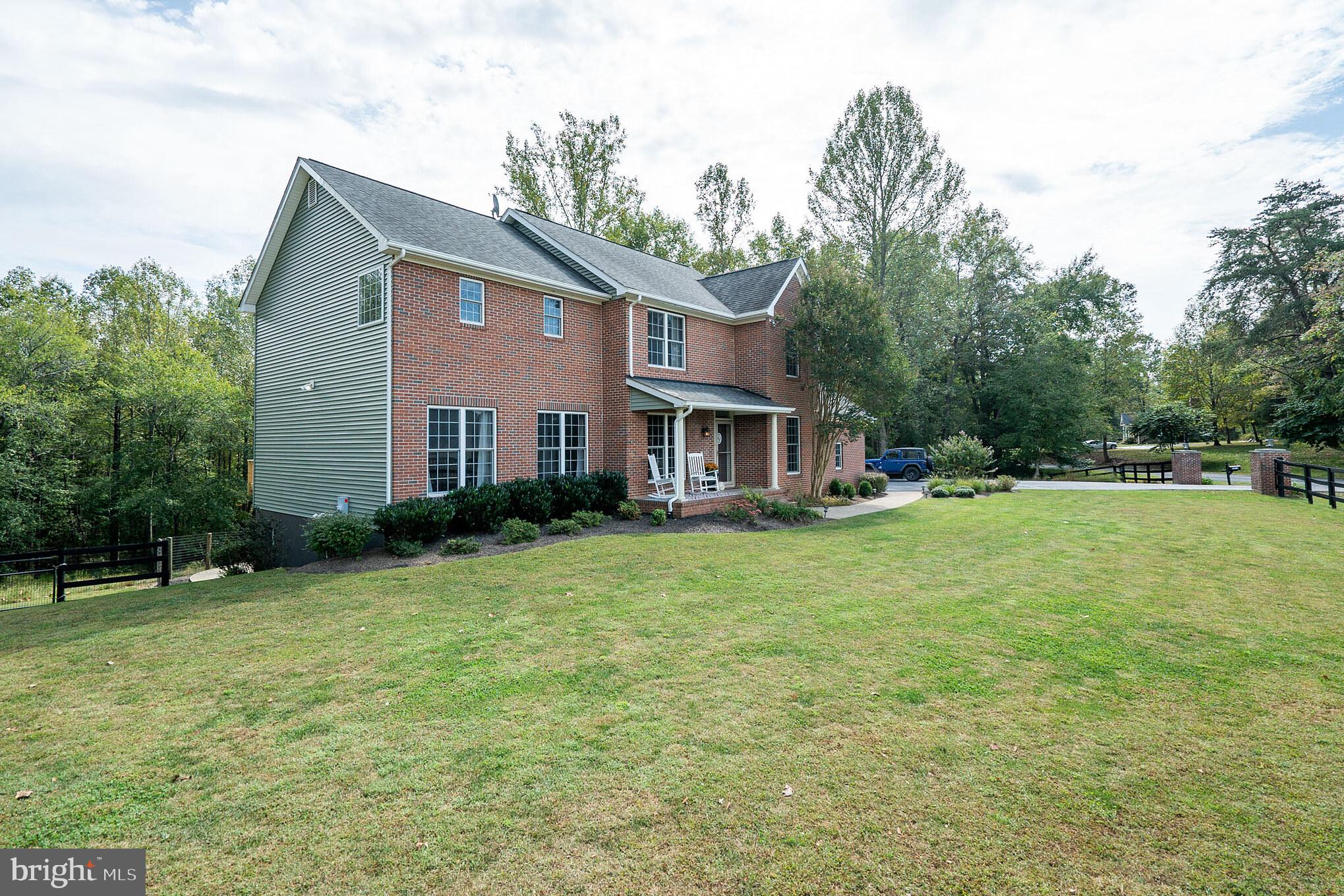 7019 Olinger Road Marshall, VA 20115 - Photo 1 of 40 Brick Front Home w/ side load garage