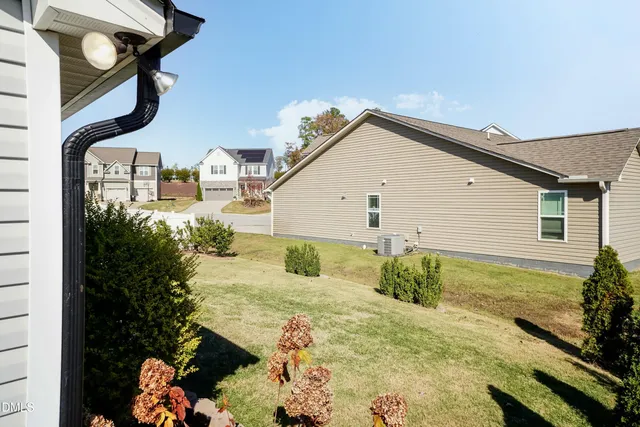 a view of a back yard of the house