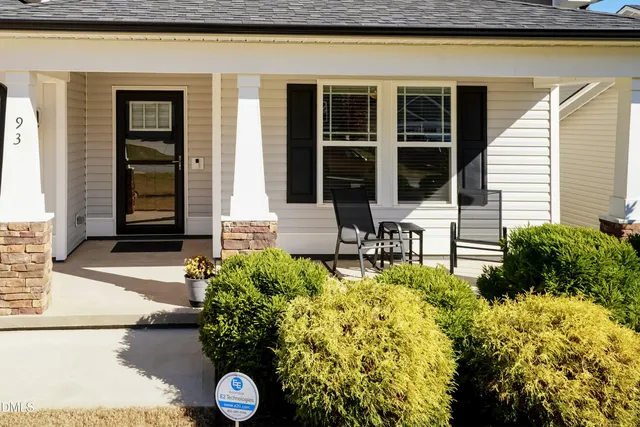 a front view of a house having yard