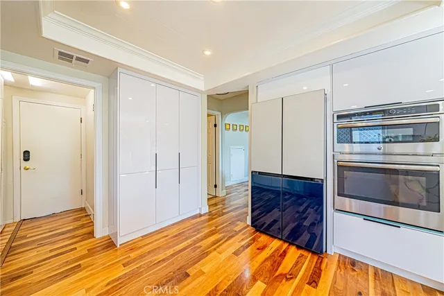 a spacious bathroom with a sink and a shower