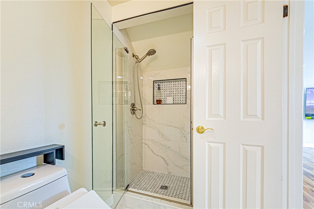 774 Stephens Avenue Fullerton, CA 92833 - Photo 14 of 53 a bathroom with a shower a toilet and a sink