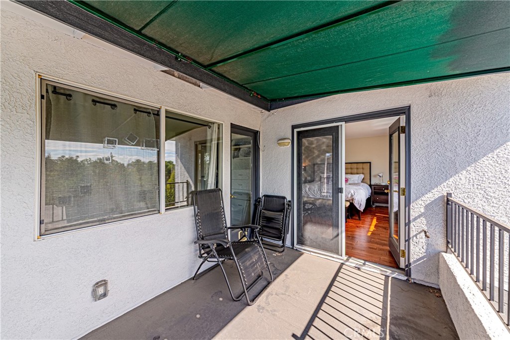 774 Stephens Avenue Fullerton, CA 92833 - Photo 20 of 53 a yellow room with wooden floor and windows
