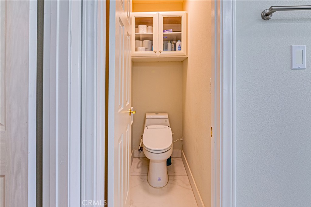 774 Stephens Avenue Fullerton, CA 92833 - Photo 25 of 53 a bathroom with a toilet and a sink