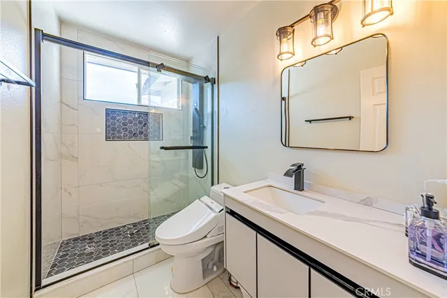 a view of a chairs and tables in a balcony