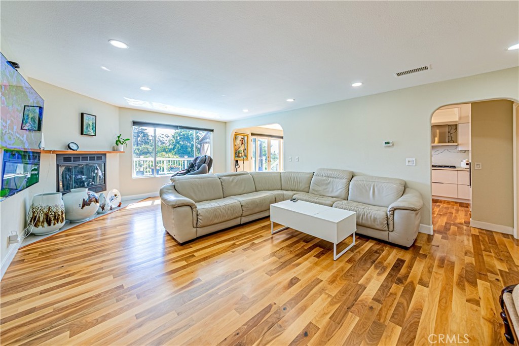774 Stephens Avenue Fullerton, CA 92833 - Photo 3 of 53 a living room with furniture and a wooden floor