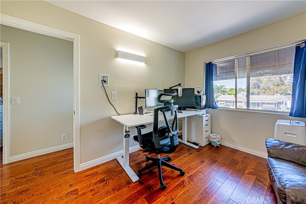 774 Stephens Avenue Fullerton, CA 92833 - Photo 31 of 53 a view of a workspace with furniture and a window