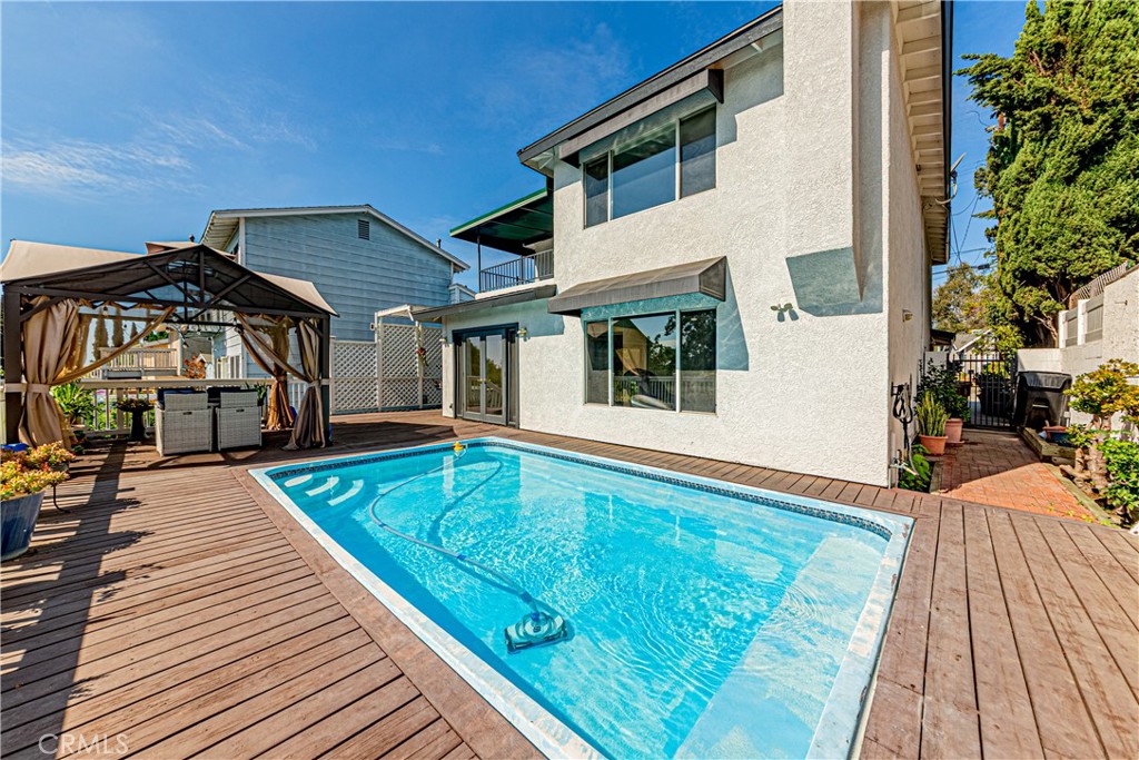 774 Stephens Avenue Fullerton, CA 92833 - Photo 33 of 53 a view of a house with pool and sitting area