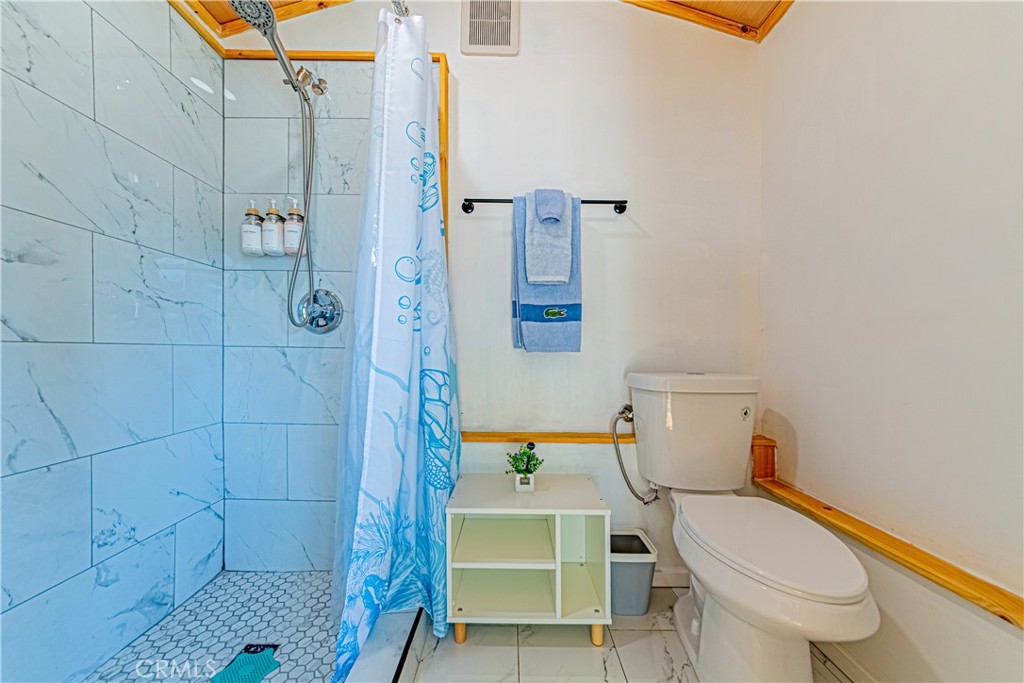 774 Stephens Avenue Fullerton, CA 92833 - Photo 44 of 53 a bathroom with a toilet and a shower