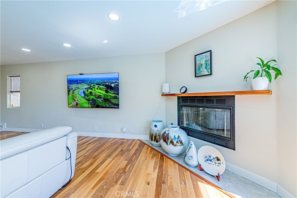 774 Stephens Avenue Fullerton, CA 92833 - Photo 5 of 53 a bedroom with a bed and a fireplace