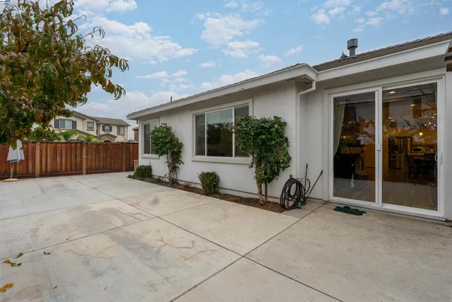 a view of a house with wooden walls