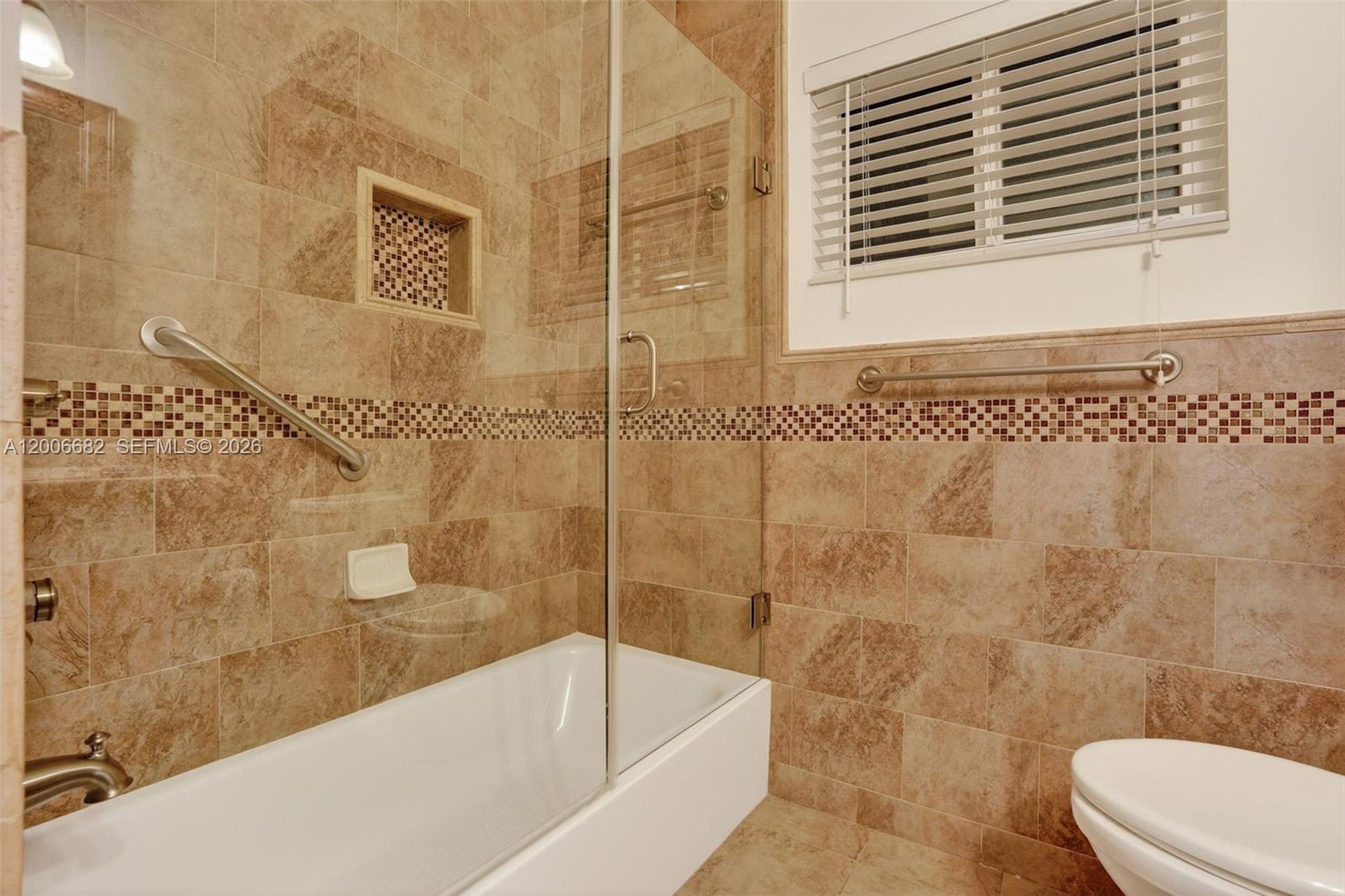 1435 Blue Road Coral Gables, FL 33146 - Photo 24 of 31 a bathroom with a bathtub and shower