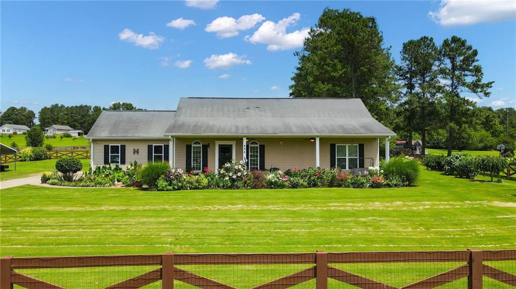 894 Denton Road Cedartown, GA 30125 - Photo 1 of 1 a front view of a house with garden