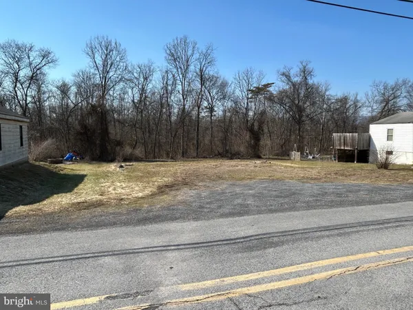 a view of swimming pool with a yard